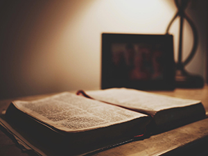 Bible Open Over A Table